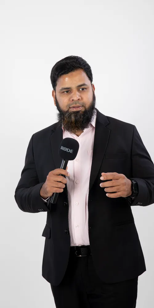 Abdul Lathif speaking with a microphone